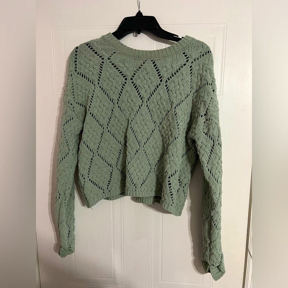 A soft, cut out pattern sweater